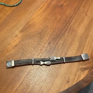 Metal arrow and multi strap leather bracelet with magnet clasp